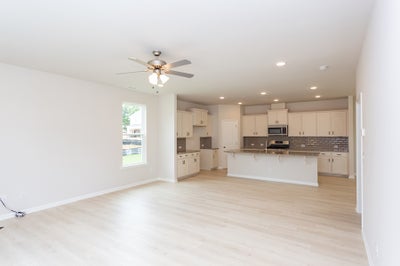 Great Room & Kitchen. 2,343sf New Home in Angier, NC