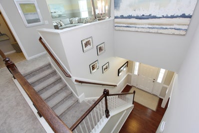 Stairwell & Foyer. Kyli Knolls New Homes in Clayton, NC